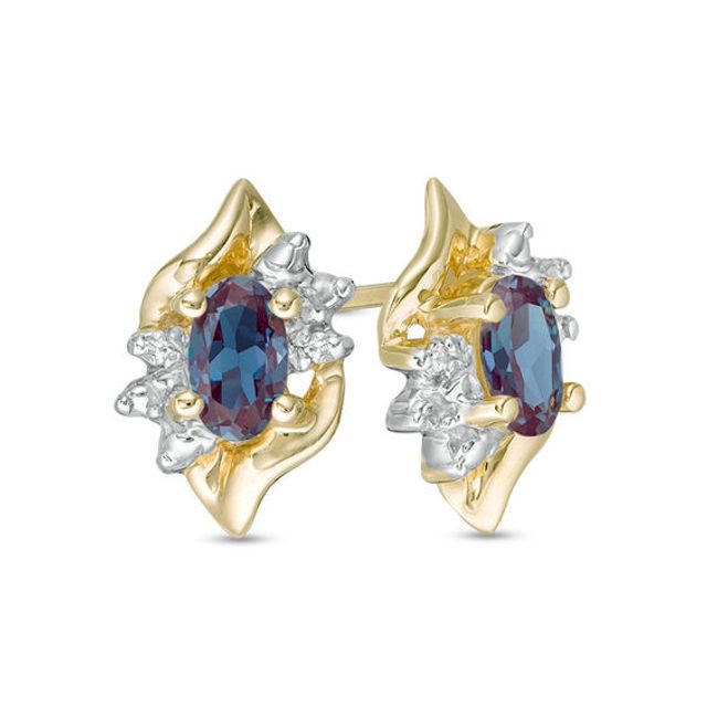 Oval Lab-Created Alexandrite and Diamond Accent Flame Burst Stud Earrings in 10K Gold