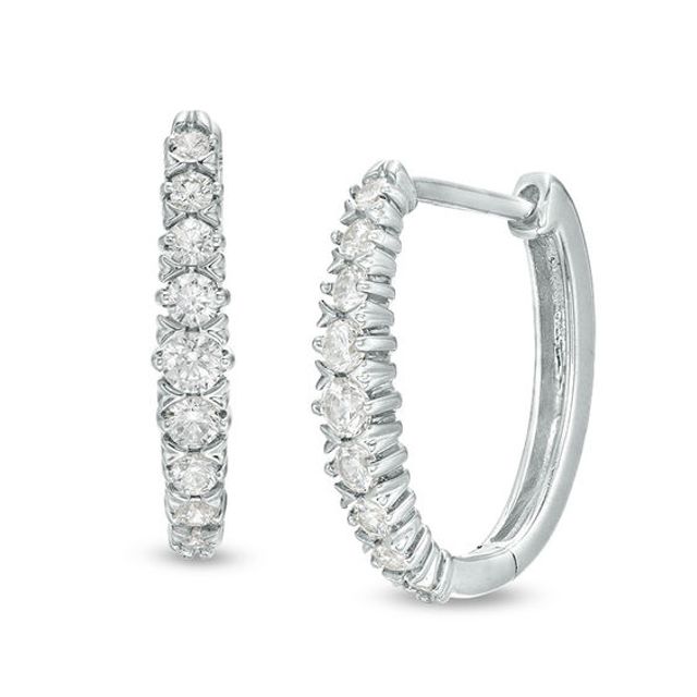 1/2 CT. T.w. Diamond Oval Hoop Earrings in 10K White Gold