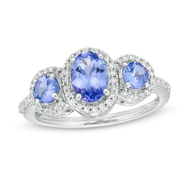 Oval Tanzanite and 1/5 CT. T.w. Diamond Frame Three Stone Ring in Sterling Silver