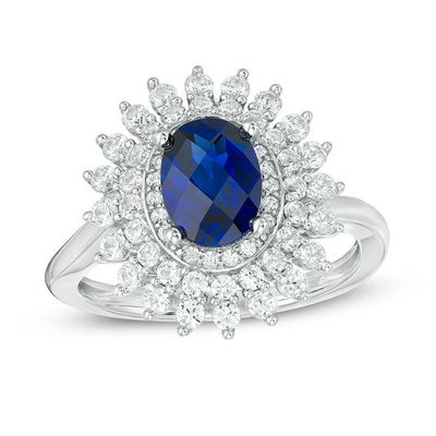 Oval Blue Sapphire and 5/8 CT. T.w. Diamond Sunburst Frame Ring in 10K White Gold