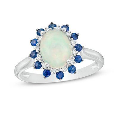 Oval Opal, Blue Sapphire and 1/15 CT. T.w. Diamond Double Sunburst Frame Ring in 10K White Gold