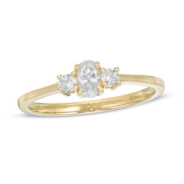 1/2 CT. T.w. Oval and Round Diamond Three Stone Engagement Ring in 14K Gold