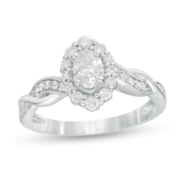 3/4 CT. T.w. Oval Diamond Frame Twist Shank Vintage-Style Engagement Ring in 10K White Gold