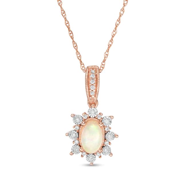 Oval Opal and 1/15 CT. T.w. Diamond Sun Frame Vintage-Style Pendant in 10K Rose Gold