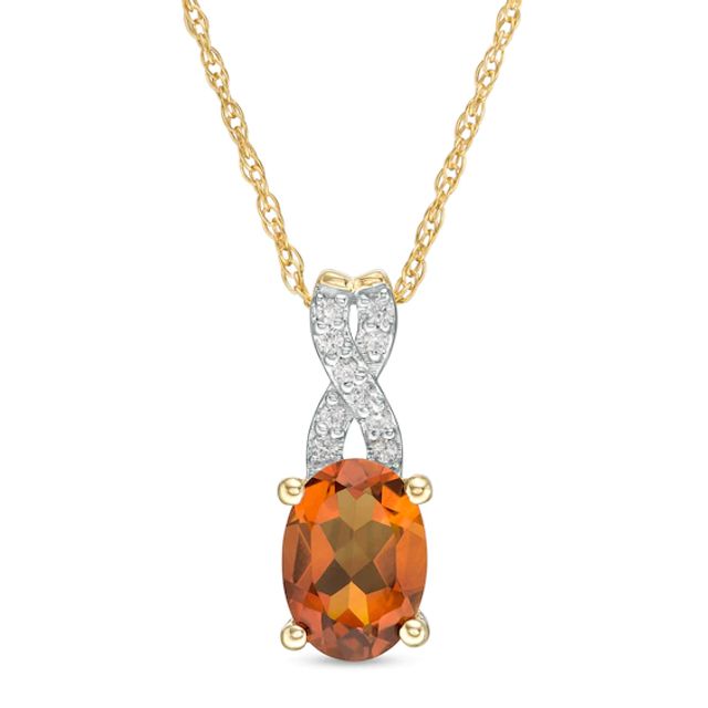 Oval Madeira Citrine and 1/20 CT. T.w. Diamond "X" Drop Pendant in 10K Gold