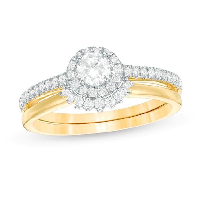 1/2 CT. T.w. Diamond Frame Bridal Set in 10K Gold