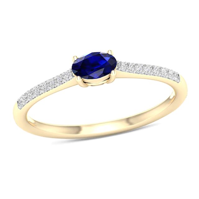 Sideways Oval Blue Sapphire and 1/15 CT. T.w. Diamond Stackable Ring in 10K Gold