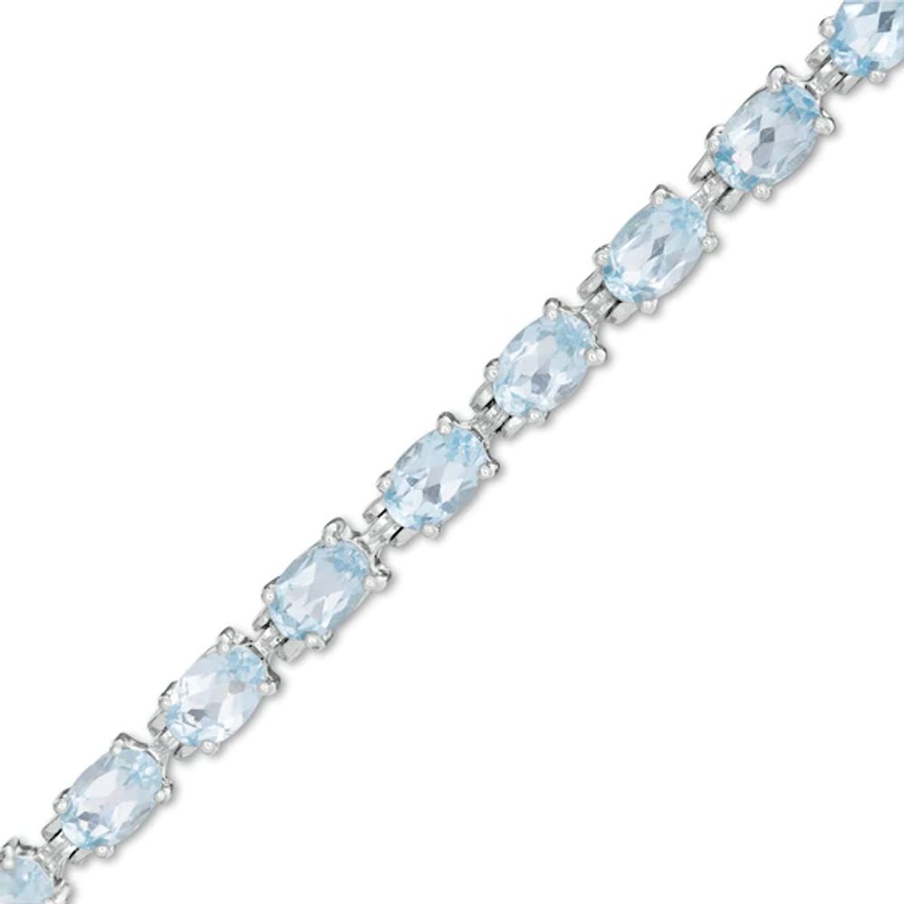 Sideways Oval Blue Topaz Tennis Bracelet in Sterling Silver - 7.5"