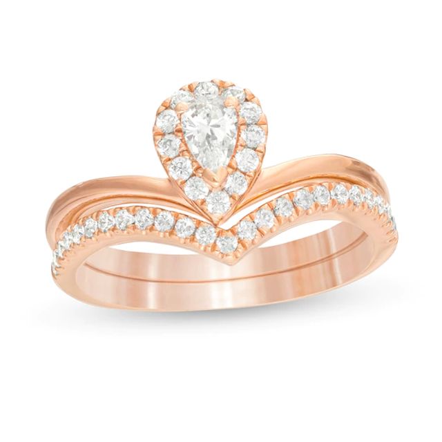 1/2 CT. T.w. Pear-Shaped Diamond Frame Chevron Bridal Set in 14K Rose Gold