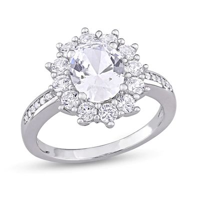 Oval Lab-Created White Sapphire and 1/20 CT. T.w. Diamond Starburst Frame Ring Sterling Silver