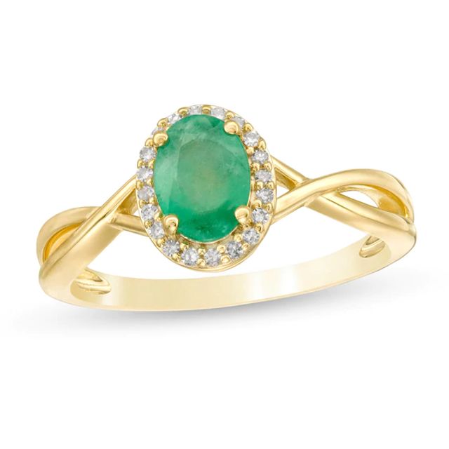 Oval Emerald and 1/15 CT. T.w. Diamond Frame Twist Shank Ring in 10K Gold