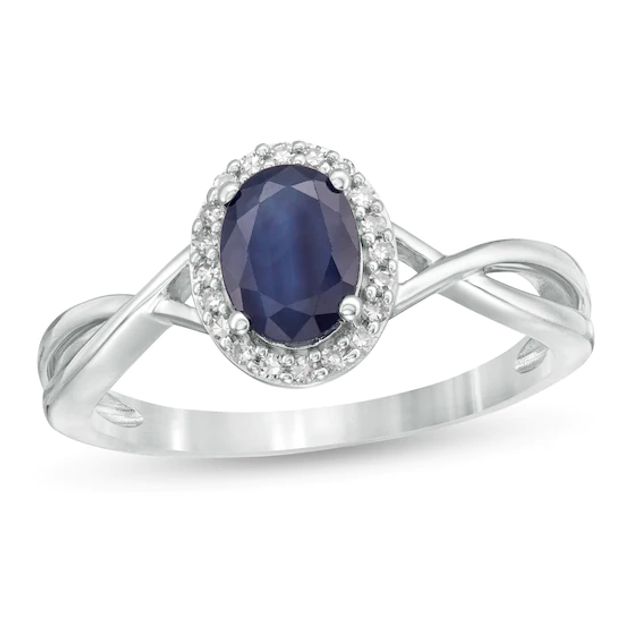 Oval Blue Sapphire and 1/15 CT. T.w. Diamond Frame Twist Shank Ring in 10K White Gold