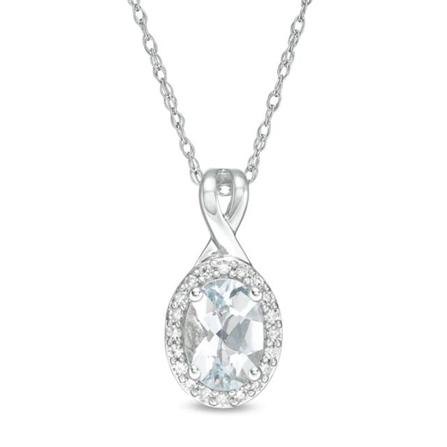 Oval Aquamarine and 1/15 CT. T.w. Diamond Frame Pendant in 10K White Gold
