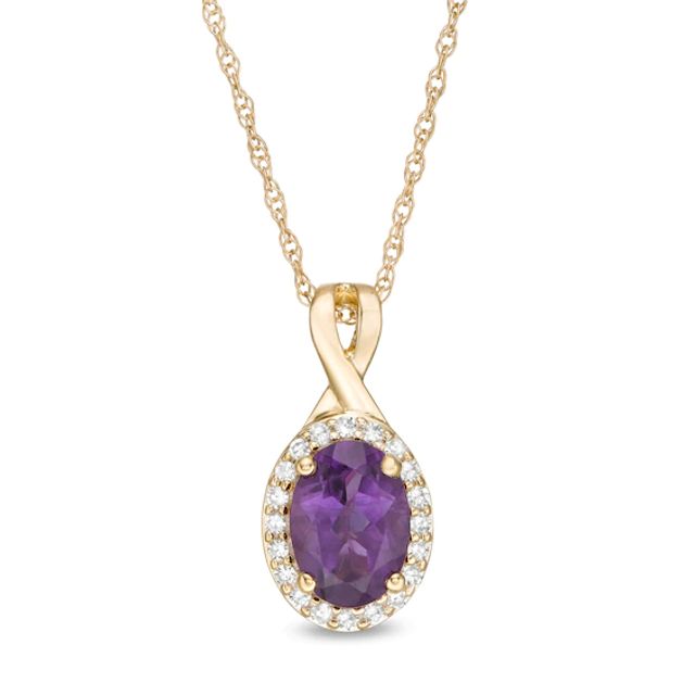Oval Amethyst and 1/15 CT. T.w. Diamond Frame Pendant in 10K Gold