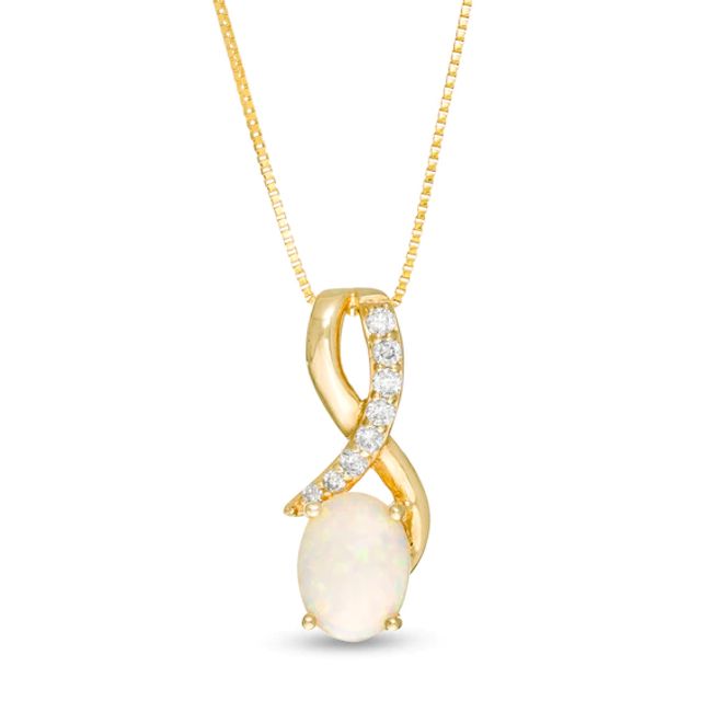 Oval Opal and 1/10 CT. T.w. Diamond Ribbon Pendant in 10K Gold