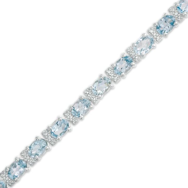 Oval Sky Blue Topaz and Diamond Accent Tennis Bracelet in Sterling Silver - 7.5"