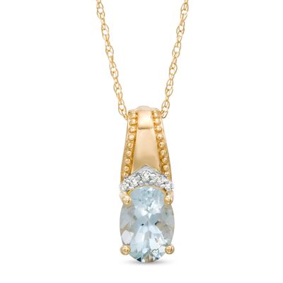 Oval Aquamarine and Diamond Accent Beaded Drop Pendant in 10K Gold