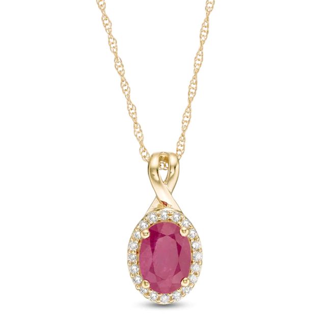 Oval Ruby and 1/15 CT. T.w. Diamond Frame Pendant in 10K Gold