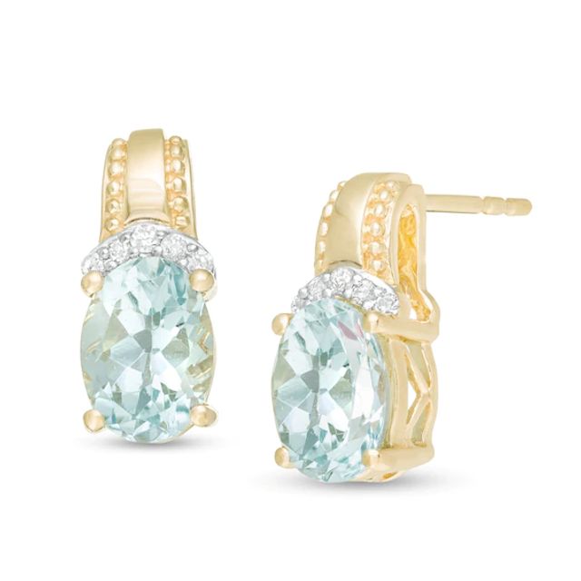 Oval Aquamarine and 1/20 CT. T.w. Diamond Beaded Drop Earrings in 10K Gold