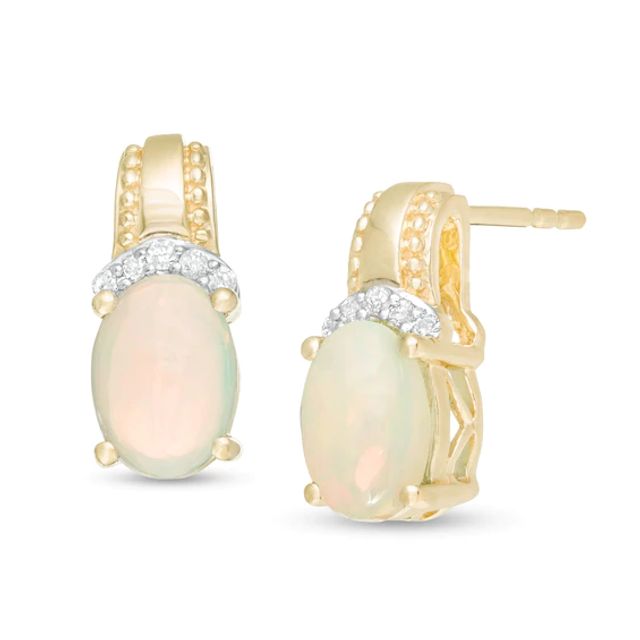 Oval Opal and 1/20 CT. T.w. Diamond Beaded Drop Earrings in 10K Gold