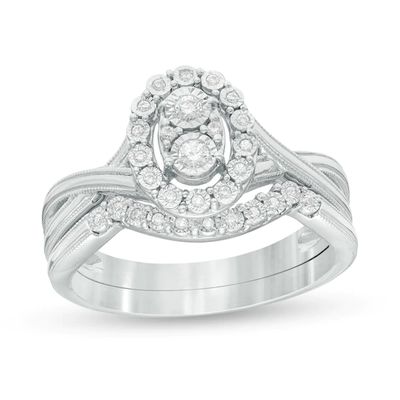1/8 CT. T.w. Composite Diamond Oval Frame Twist Shank Vintage-Style Bridal Set in Sterling Silver