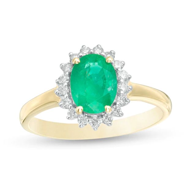 Oval Emerald and 1/5 CT. T.w. Diamond Starburst Frame Ring in 10K Gold