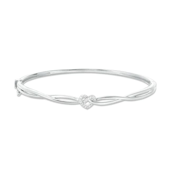 1/10 CT. T.w. Diamond Heart Knot Bangle in Sterling Silver