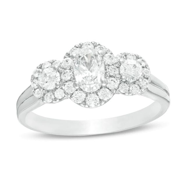 Celebration Ideal 1 CT. T.w. Oval Certified Diamond Frame Three Stone Engagement Ring in 14K White Gold (I/I1)