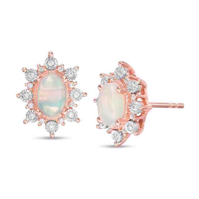 Oval Opal and 1/8 CT. T.w. Diamond Starburst Frame Vintage-Style Stud Earrings in 10K Rose Gold