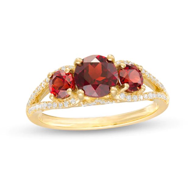 6.0mm Garnet and 1/5 CT. T.w. Diamond Three Stone Split Shank Ring in 10K Gold