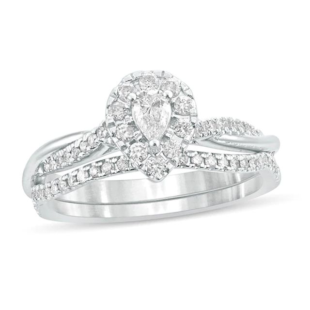 1/2 CT. T.w. Pear-Shaped Diamond Frame Twist Shank Bridal Set in 10K White Gold