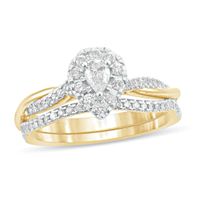 1/2 CT. T.w. Pear-Shaped Diamond Frame Twist Shank Bridal Set in 10K Gold