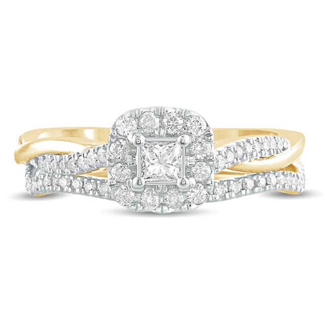 1/2 CT. T.w. Princess-Cut Diamond Frame Twist Shank Bridal Set in 10K Gold