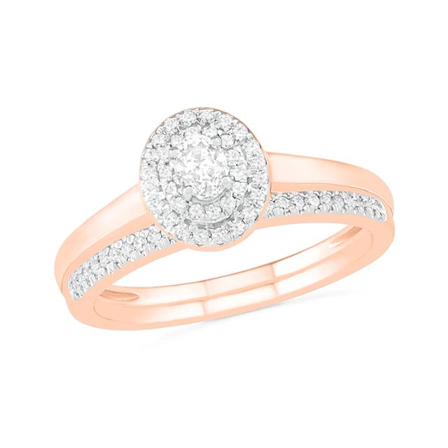 3/8 CT. T.w. Oval Diamond Double Frame Bridal Set in 10K Rose Gold