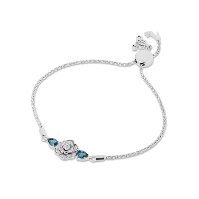 Enchanted Disney Cinderella Pear-Shaped London Blue Topaz and 1/10 CT. T.w. Diamond Bolo Bracelet in Sterling Silver - 9"