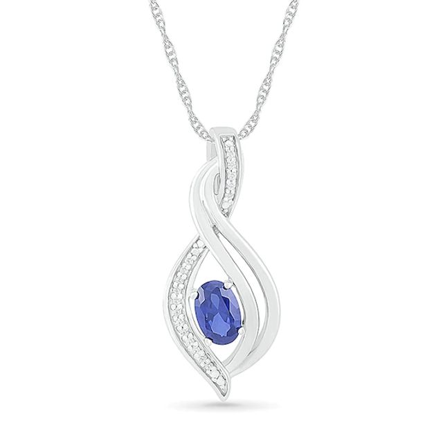 Oval Blue Lab-Created Sapphire and 1/20 CT. T.w. Diamond Flame Drop Pendant in Sterling Silver