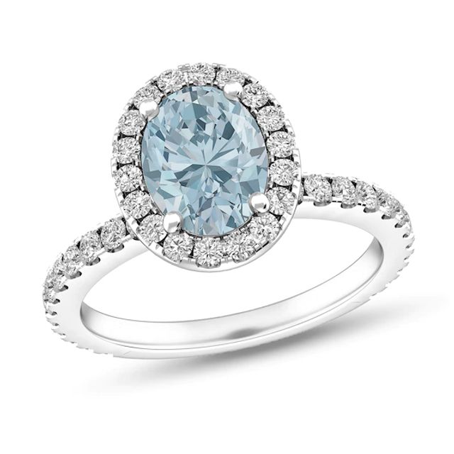 Oval Aquamarine and White Topaz Frame Ring in Sterling Silver