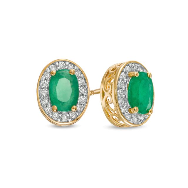 Oval Emerald and 1/8 CT. T.w. Diamond Frame Ornate Stud Earrings in 10K Gold