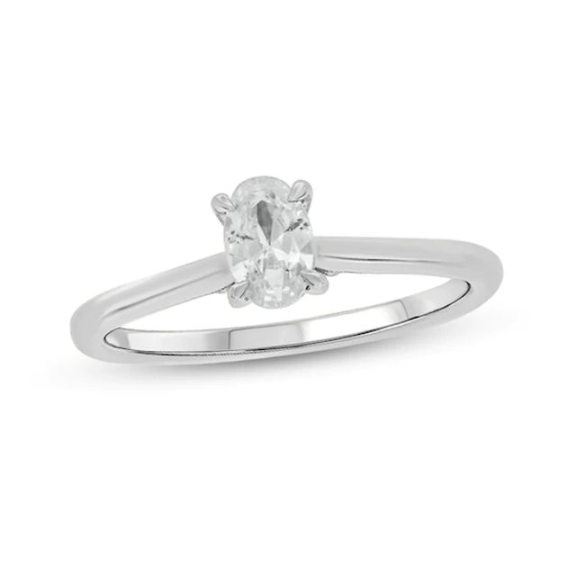 1/2 CT. T.w. Oval Diamond Solitaire Engagement Ring in 14K White Gold (I/I2)