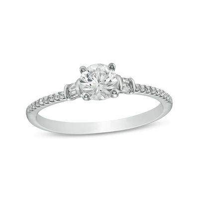 White Lab-Created Sapphire and 1/10 CT. T.w. Baguette and Round Diamond Side Accent Engagement Ring in 10K White Gold