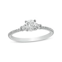White Lab-Created Sapphire and 1/10 CT. T.w. Baguette and Round Diamond Side Accent Engagement Ring in 10K White Gold