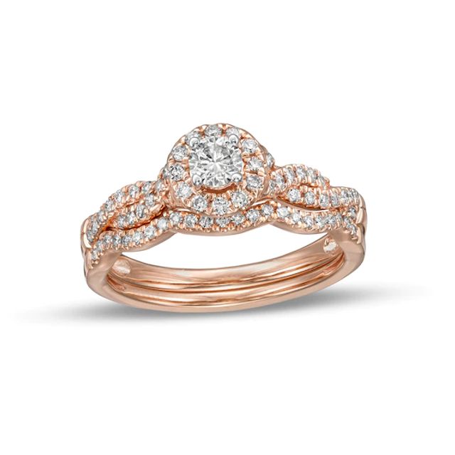 1/2 CT. T.w. Diamond Frame Twist Shank Bridal Set in 10K Rose Gold (I/I2)