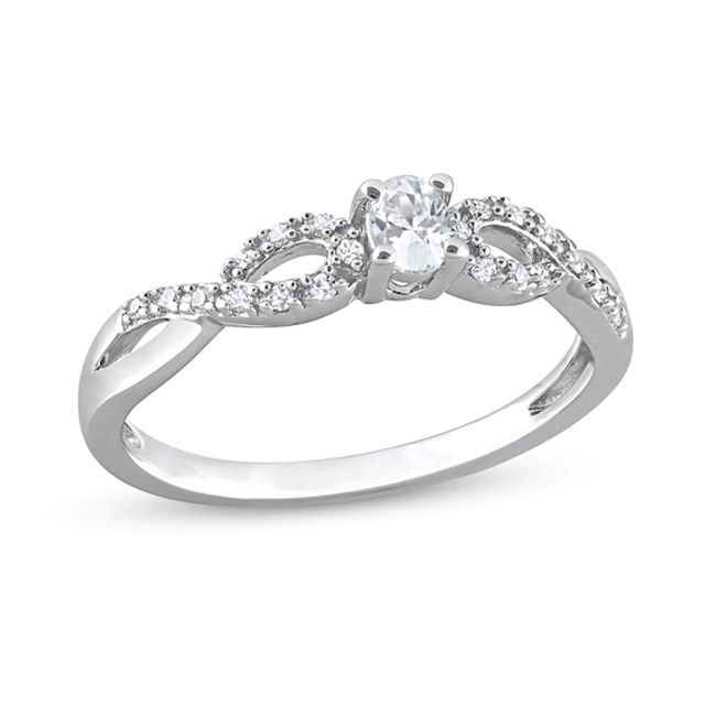 Oval White Lab-Created Sapphire and 1/15 CT. T.w. Diamond Twist Split Shank Promise Ring Sterling Silver