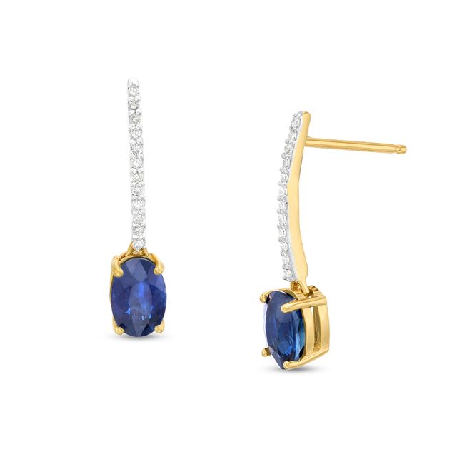 Oval Blue Sapphire and 1/15 CT. T.w. Diamond Drop Earrings in 10K Gold