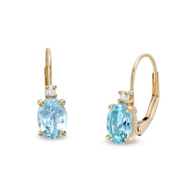 Oval Aquamarine and 1/20 CT. T.w. Diamond Drop Earrings in 10K Gold