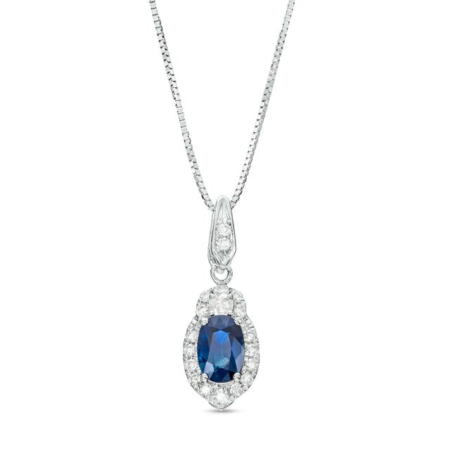 Oval Blue Sapphire and 1/6 CT. T.w. Diamond Frame Pendant in 10K White Gold