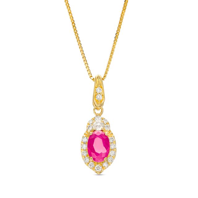 Oval Ruby and 1/6 CT. T.w. Diamond Frame Pendant in 10K Gold