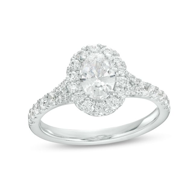 1-1/3 CT. T.w. Certified Oval Diamond Frame Split Shank Engagement Ring in 14K White Gold (I/I1)