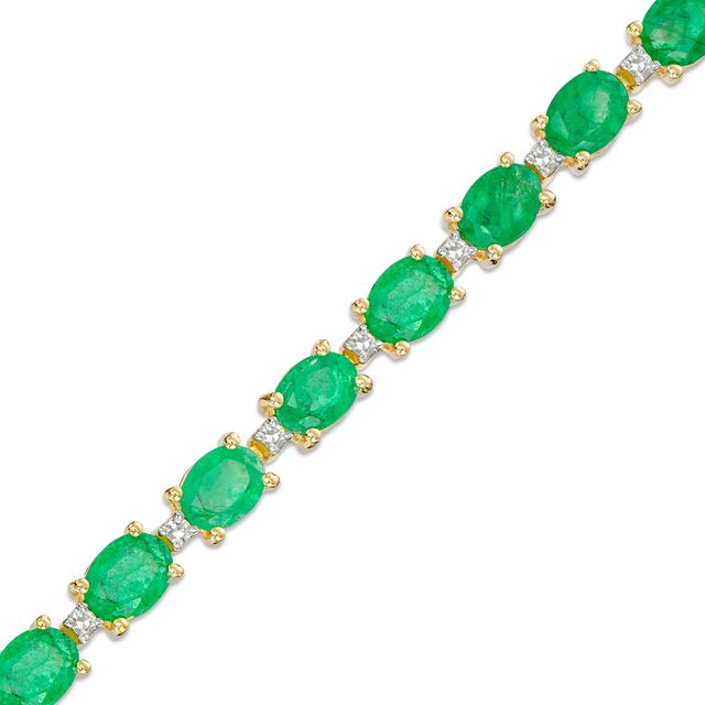 Oval Emerald and 1/6 CT. T.w. Diamond Alternating Line Bracelet in 10K Gold