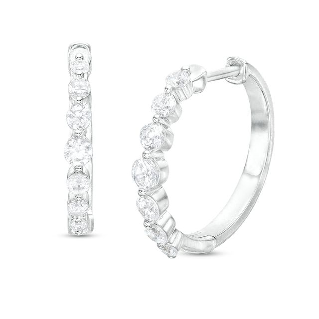 1/2 CT. T.w. Diamond Seven Stone Hoop Earrings in 10K White Gold